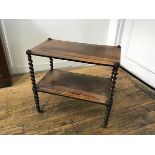 A 19thc rosewood two tier etagere raised on barley twist supports, with brass caps and castors (h.