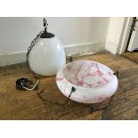 An opaque snowdrop style glass pendant light fitting with bronzed metal fixing and a 1930s pink