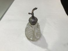 A crystal triangular tapered perfume bottle mounted with Birmingham silver chased top (missing