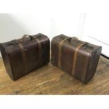A pair of reproduction bentwood style travel carry on cases with leather style straps and handles to