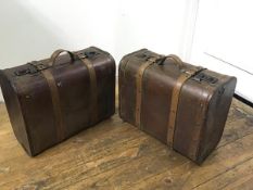 A pair of reproduction bentwood style travel carry on cases with leather style straps and handles to