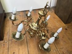 A Dutch style cast brass six branch pendant light fitting of baluster form, with loop handle to