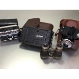 A Kodak folding camera complete with original case, an Agfa Clack German camera, a pair of opera