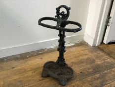 A Victorian style cast iron two division stick stand with painted green finish (h. 53cm x 28cm x
