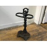 A Victorian style cast iron two division stick stand with painted green finish (h. 53cm x 28cm x