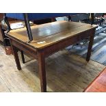 A 19thc pine kitchen table, the rectangular plank top with moulded edge, above a single frieze