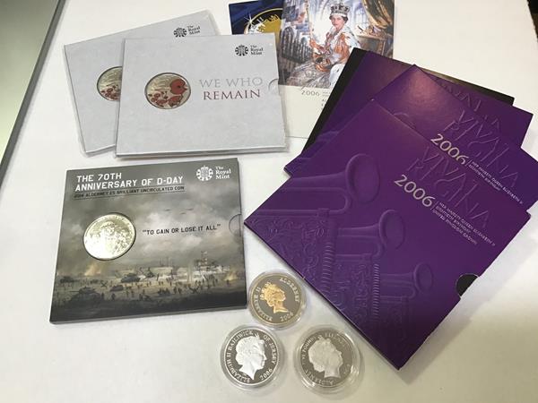 A collection of five pound silver proof coins, nickel coins etc. including We Who Remain, 2006, 70th