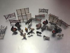 A group of diecast model farm animals including turkeys, sheep, dogs, chickens, fence etc. decorated