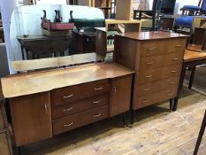 A 1940s/50s Utility two piece bedroom suite comprising a walnut veneered tallboy chest fitted five