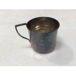 A Sheffield silver plain Christening mug with fluted handle to side, uninscribed (h.6cm x d.6cm) (