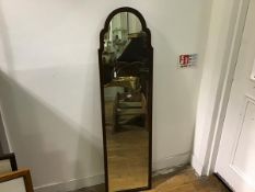 A narrow mahogany arched framed wall mirror (h.125cm x 33cm)