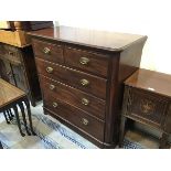 A 19thc stained mahogany chest, the rectangular top with moulded edge above two short and three