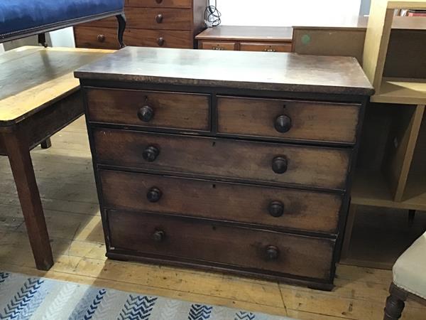 A 19thc mahogany chest, the rectangular top with moulded edge above two short and three long