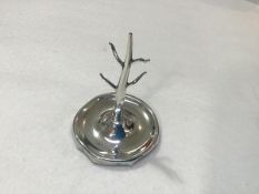 An Edwardian Birmingham silver ring stand of tapered form with four branches, on circular base (base