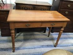 A satinwood birch Edwardian side table, the rectangular top with moulded edge above two frieze