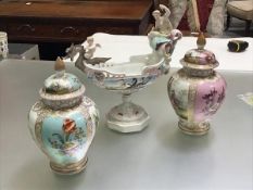 A Capodimonte style comport, with mermaids and cherub riding a dragon style boat (losses) (