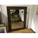 A walnut framed modern bevelled glass wall mirror (h.122cm x 91cm)