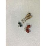 A pair of carnelian oval bead drop earrings (l.1.5cm) and a pair of Victorian style yellow metal