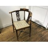 An Edwardian mahogany inlaid corner chair with pierced splat, with inset seat on turned tapered