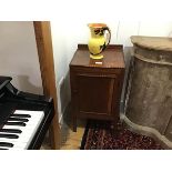 An oak ledgeback bedside with beaded border, on square supports (some losses to beading) (h.78cm x