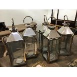 A set of five stainless steel style square storm lanterns (h.50cm including loop x 15cm x 15cm)