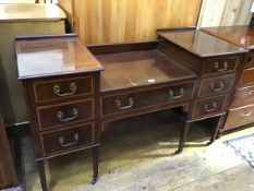 An Edwardian dressing table, the sunk centre with moulded edge and centre frieze drawer flanked by a