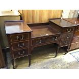 An Edwardian dressing table, the sunk centre with moulded edge and centre frieze drawer flanked by a