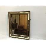 A 19thc gilded composition and mirror panelled wall mirror (54cm x 44cm)