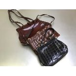 A vintage brown crocodile skin 1930s lady's handbag, The Martin, made in England, with ostrich