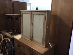 A 19thc shaped sided pine and plywood two door wall cabinet (h.68cm x 70cm x 23cm)