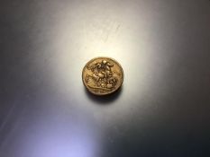 A Victorian gold sovereign dated 1895