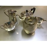 An Epns three piece panelled tea service, an Epns hot water tapered jug and a 19thc frosted glass