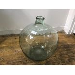 A large glass carboy (h.53cm d. 40cm)