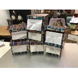 Seven boxes containing a large collection of First Day covers in original envelopes, most