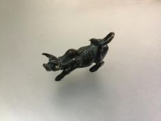 A patinated bronze Spanish style bull (h.3cm x 5cm)