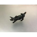 A patinated bronze Spanish style bull (h.3cm x 5cm)