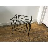 A wrought iron two section magazine rack with ball terminals (h.41cm x 38cm x 25cm)