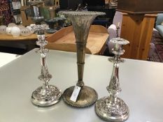 A pair of Victorian Epns circular candlesticks, one with different top, raised on circular moulded