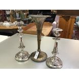 A pair of Victorian Epns circular candlesticks, one with different top, raised on circular moulded