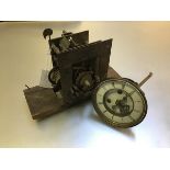 A 19thc longcase clock movement and a 19thc mantel clock movement with visible escapement and twin