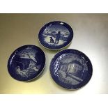 A set of three Royal Copenhagen porcelain Christmas plates, 1975, 1976 and 1977, signed verso (d.