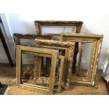 Four various gilt composition frames, and three various slips, one ebonised (largest:75cm x 54cm