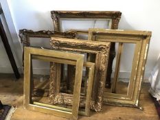 Four various gilt composition frames, and three various slips, one ebonised (largest:75cm x 54cm