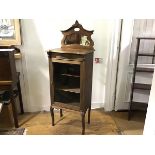 An Edwardian beech ledgeback mirror back display cabinet, the top with carved floral surmount and