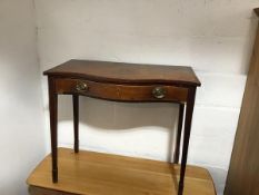 A 19thc serpentine side table fitted single frieze drawer on square tapered inlaid supports (losses)