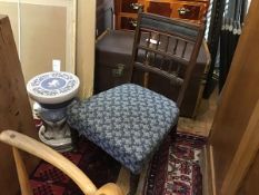 An Edwardian walnut nursing chair, with spindle back and stuffover seat, on turned supports (h.