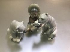 Two Lladro Spanish porcelain Polar Bear figures (tallest: 11cm shortest: 8cm) and an Eskimo Girl