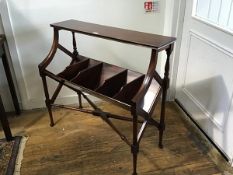 A reproduction mahogany bookstand, the rectangular top with moulded edge above five open sections,