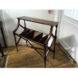 A reproduction mahogany bookstand, the rectangular top with moulded edge above five open sections,