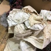 A box of Victorian gowns including vintage underpants, embroidered mats, two nighcaps, smoking caps,